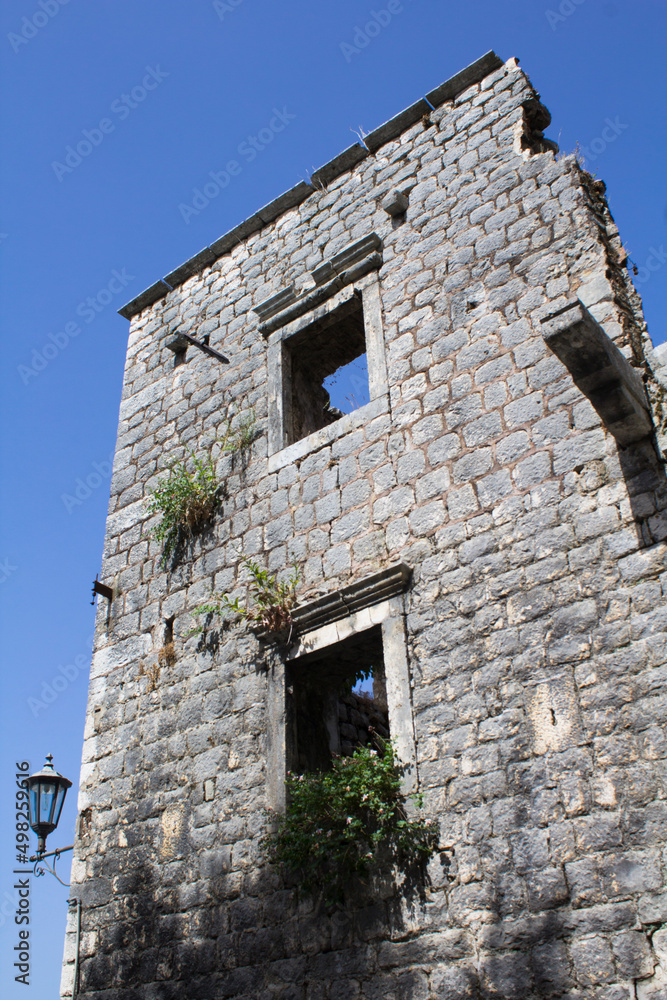 Close-up on the destroyed old building. Perast. Montenegro.