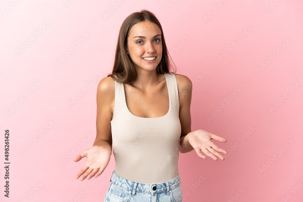 Young woman over isolated pink background happy and smiling Young woman over isolated pink background happy and smiling