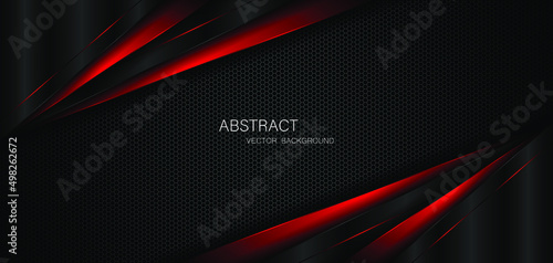 Abstract black and red polygons overlapped on dark steel mesh background with free space for design. modern technology innovation concept background 