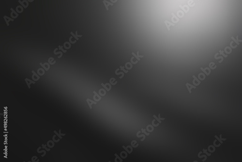 Abstract black and gray gradient soft light background of studio room for art design.