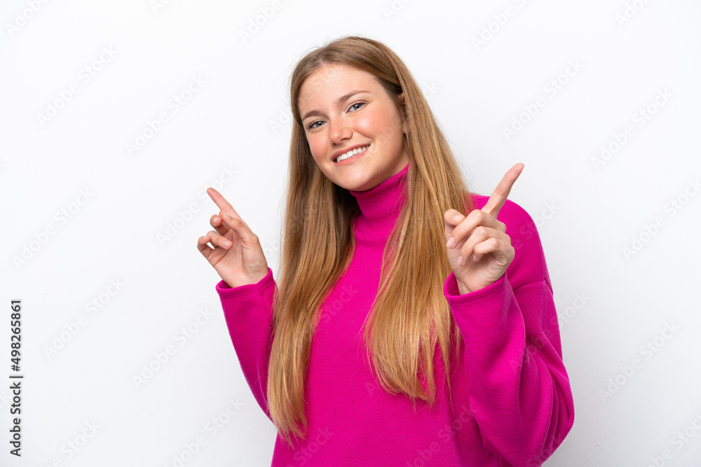 Young caucasian woman isolated on white background pointing finger to the laterals and happy Young caucasian woman isolated on white background pointing finger to the laterals and happy