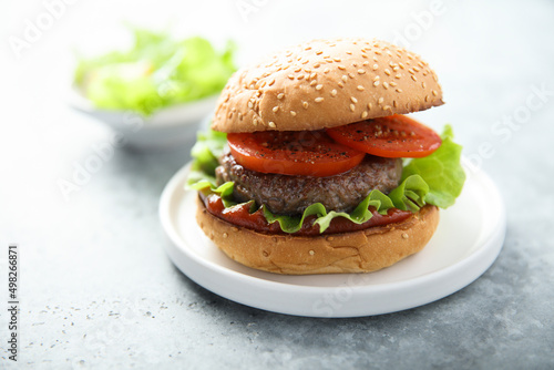 Traditional homemade burger with fresh tomato