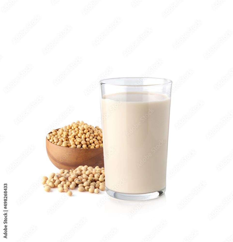 Soybeans or soya bean in a wooden bowl and Soy milk isolated on white background. Soybeans or soya bean in a wooden bowl and Soy milk isolated on white background.