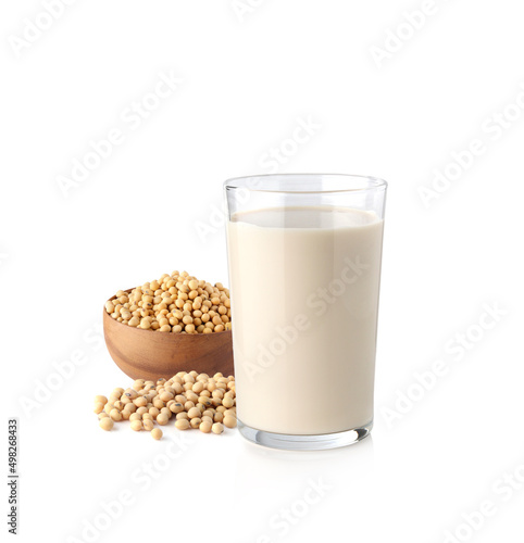 Soybeans or soya bean in a wooden bowl and Soy milk isolated on white background.