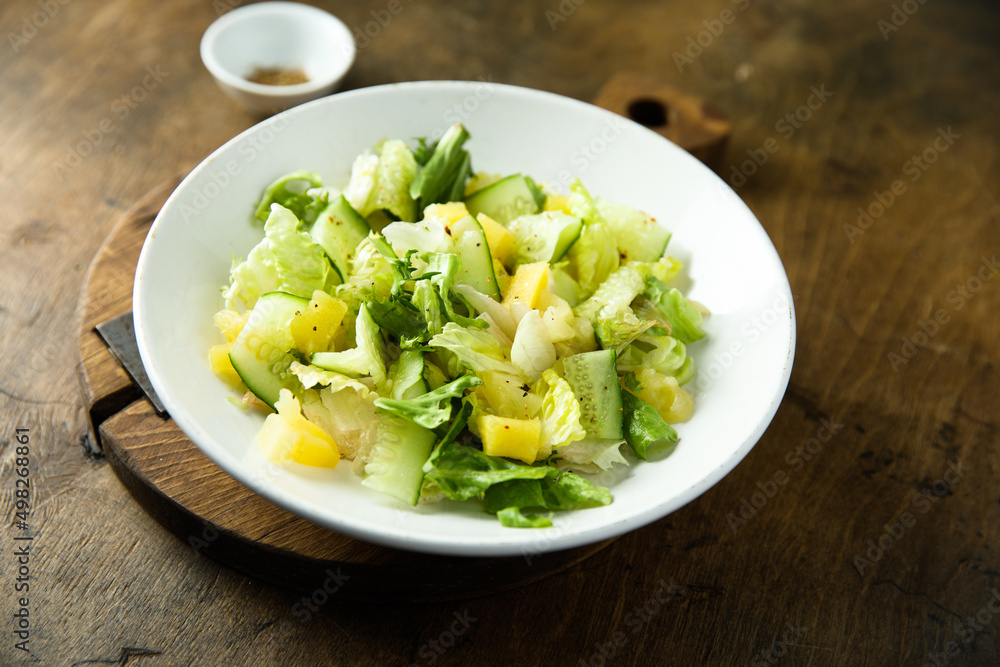Leaf salad with cucumber and pineapple Leaf salad with cucumber and pineapple