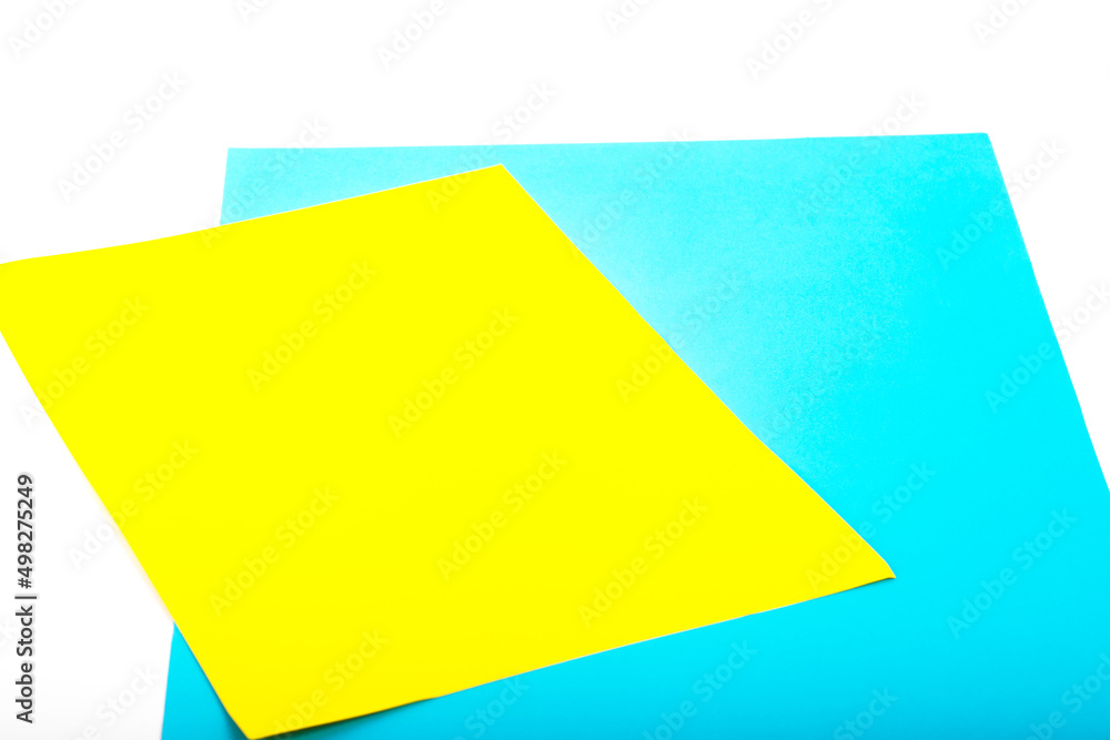 Paper yellow and blue colours as the symble flags of Ukraine. Background for protest against war, military conflict. Paper yellow and blue colours as the symble flags of Ukraine. Background for protest against war, military conflict.