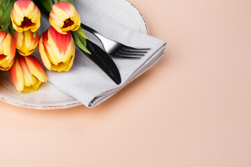 Festive Table Setting With Tulips. Holiday Table Set for Birthday, Mother's Day or for another holiday.