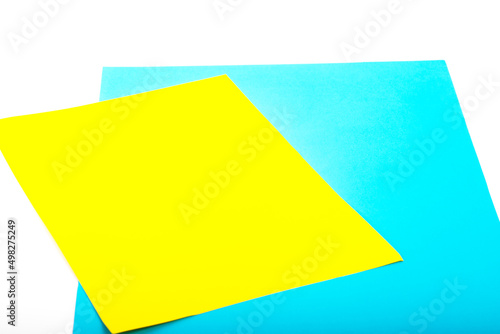 Paper yellow and blue colours as the symble flags of Ukraine. Background for protest against war, military conflict.