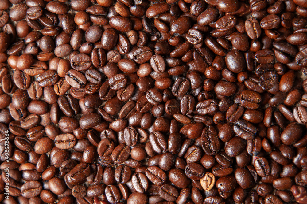 Roasted coffee beans, dark roasted coffee beans background. Roasted coffee beans, dark roasted coffee beans background.