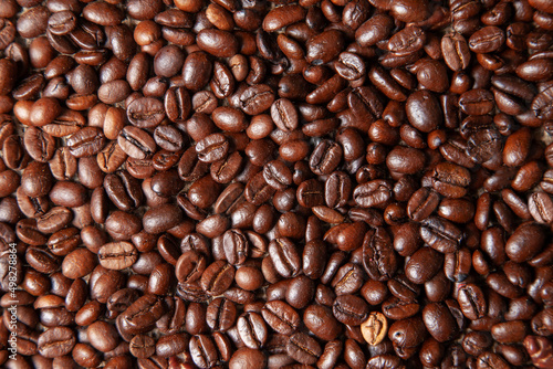 Roasted coffee beans  dark roasted coffee beans background.