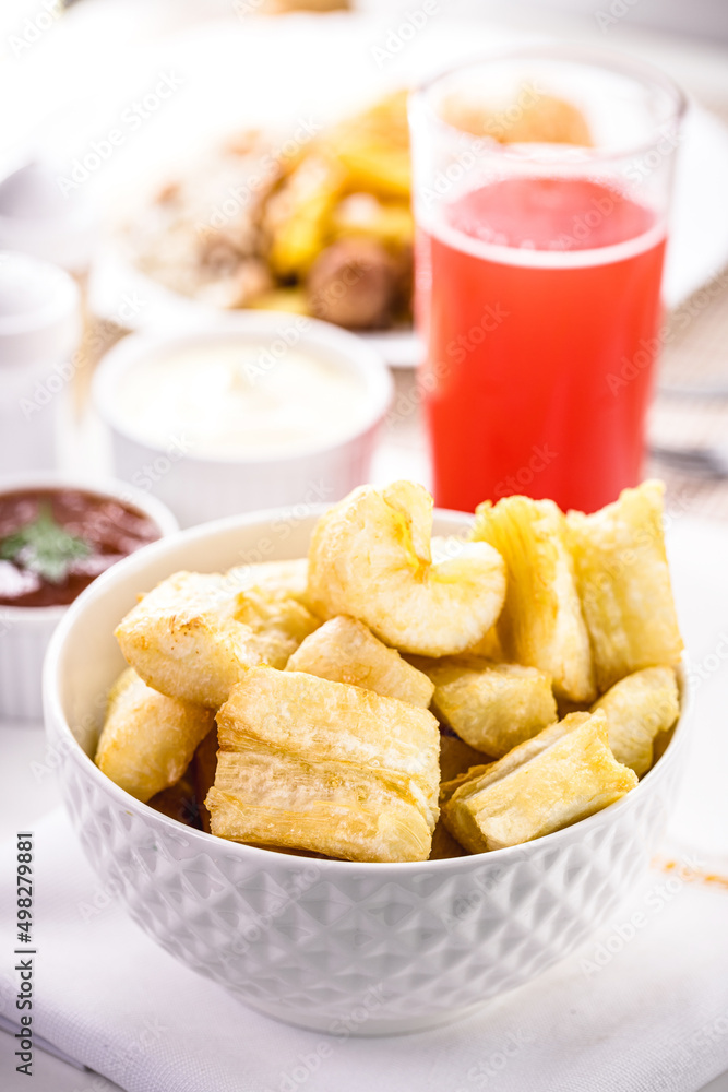 Fried cassava, typical Brazilian snack served during lunch or dinner, healthy homemade food Fried cassava, typical Brazilian snack served during lunch or dinner, healthy homemade food