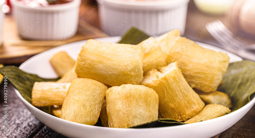 fried cassava, snack made from cassava root and served fried, traditional south american restaurant food garnish fried cassava, snack made from cassava root and served fried, traditional south american restaurant food garnish