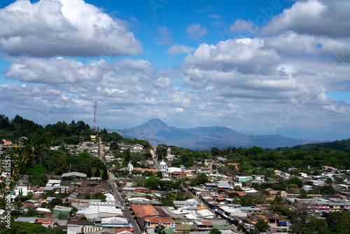 View of Ataco, town in El Salvador with center, houses, streets. Aerial view with volcano in the distance photo