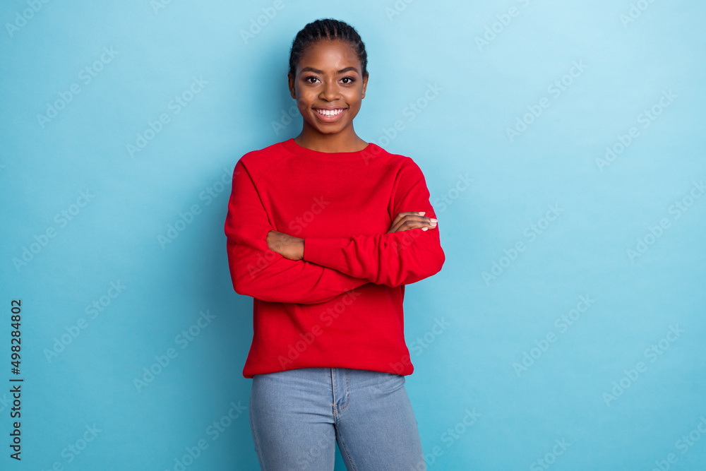 Photo of boss millennial brunette lady crossed arms wear red pullover isolated on blue color background Photo of boss millennial brunette lady crossed arms wear red pullover isolated on blue color background