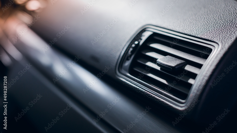 Air vent grill and air conditioning in modern car interior. Air vent grill and air conditioning in modern car interior.