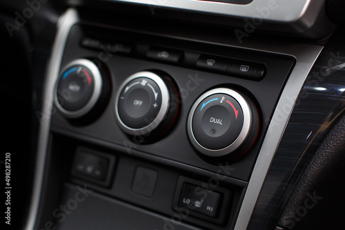 Car climate control panel for driver and passenger.