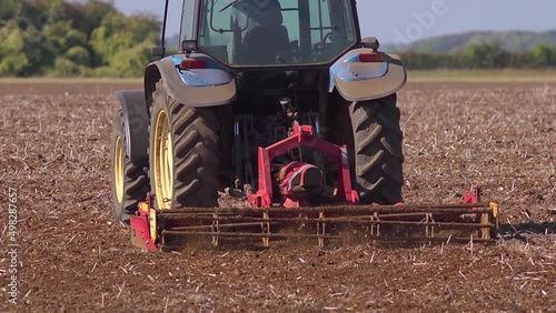 Close up of a powered harrow in action. Slow motion
