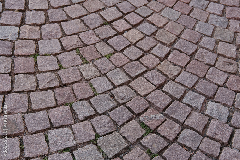 rough texture of an old medieval stone. Background for design, abstract patterns, copy space, residents and tourists walk the streets, concept of tourism, travel rough texture of an old medieval stone. Background for design, abstract patterns, copy space, residents and tourists walk the streets, concept of tourism, travel
