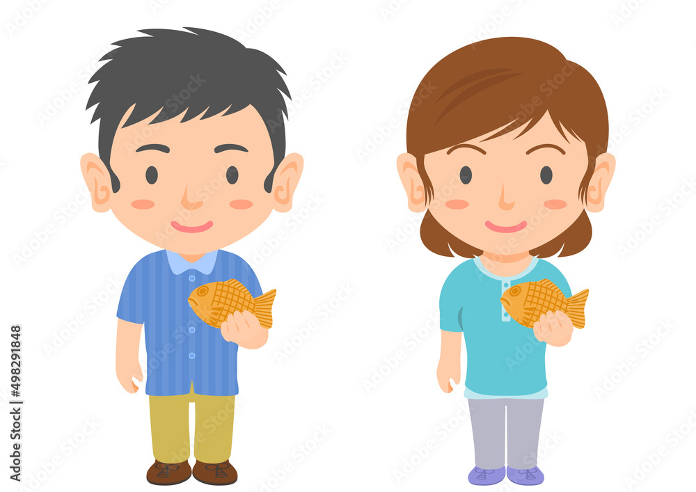 たい焼きを食べる男女