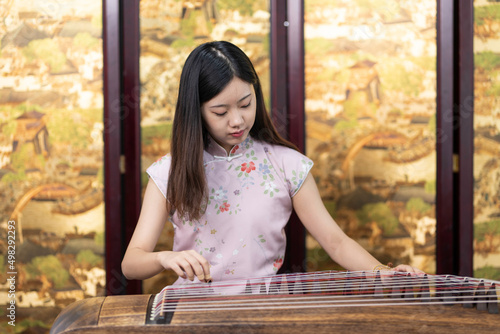 Photos Playing the zither