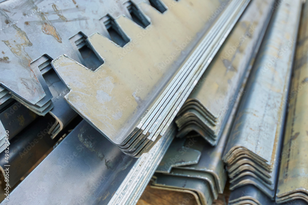 Iron and steel crude sheet metal, detail, in a row, stacked, tank. Iron and steel crude sheet metal, detail, in a row, stacked, tank.
