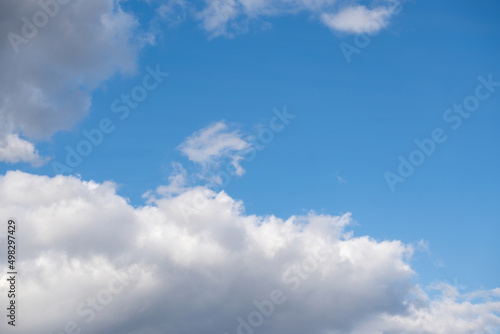 clouds in the blue sky with sun