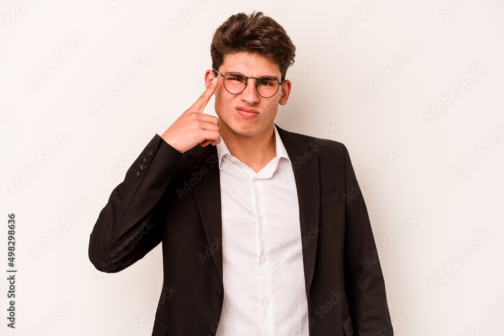 Young caucasian business man isolated on white background showing a disappointment gesture with forefinger. Young caucasian business man isolated on white background showing a disappointment gesture with forefinger.