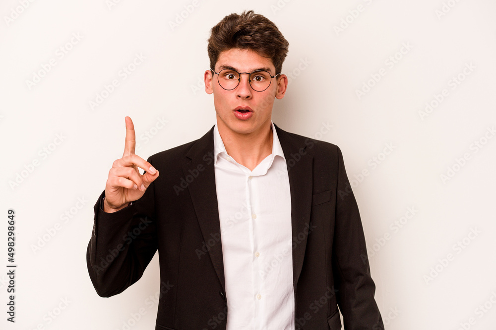 Young caucasian business man isolated on white background having some great idea, concept of creativity.