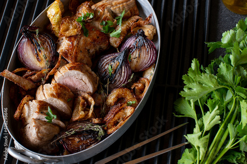 Roasted pork tenderloin with caramelized and deep fried onions photo