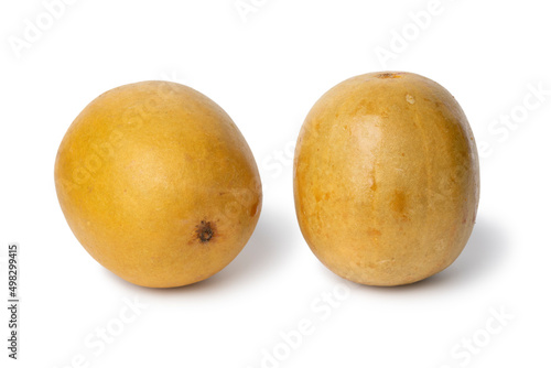 Pair of whole dried monk fruit on white background close up photo
