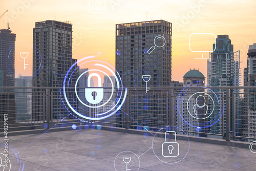 Rooftop with concrete terrace, Bangkok sunset skyline. Cyber security concept to protect clients confidential information. IT hologram padlock icons. City downtown. Double exposure.