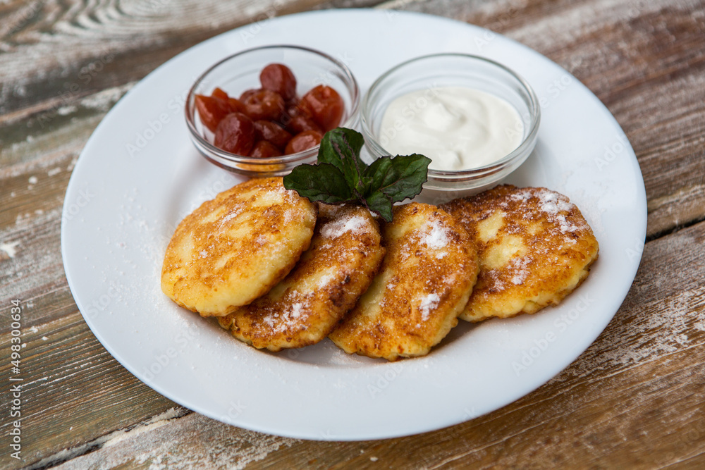 Ideal breakfast with pancakes and eggs. Ideal breakfast with pancakes and eggs.