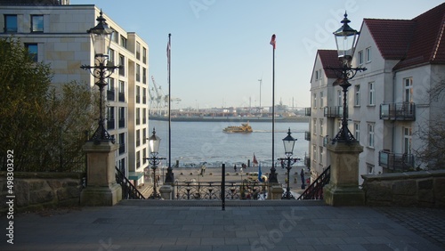 Port of Hamburg, River Elbe, with the Koehlbrandtreppe in the foreground. Ferry passing by.