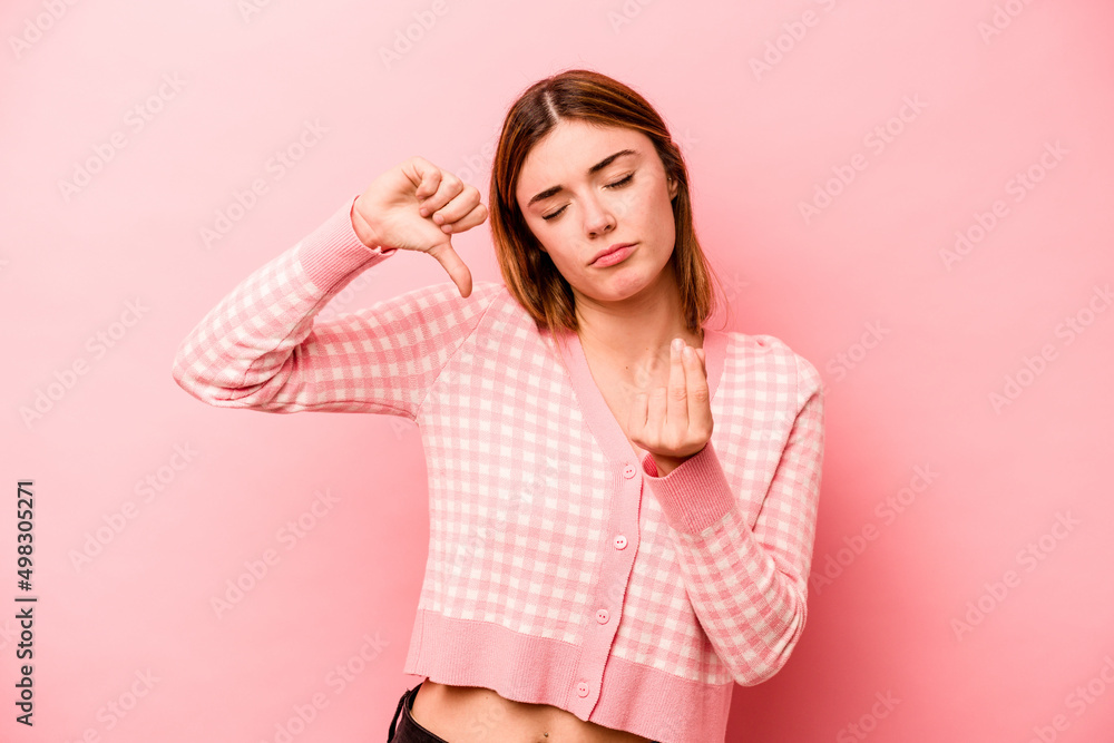 Young caucasian woman isolated on pink background showing that she has no money. Young caucasian woman isolated on pink background showing that she has no money.