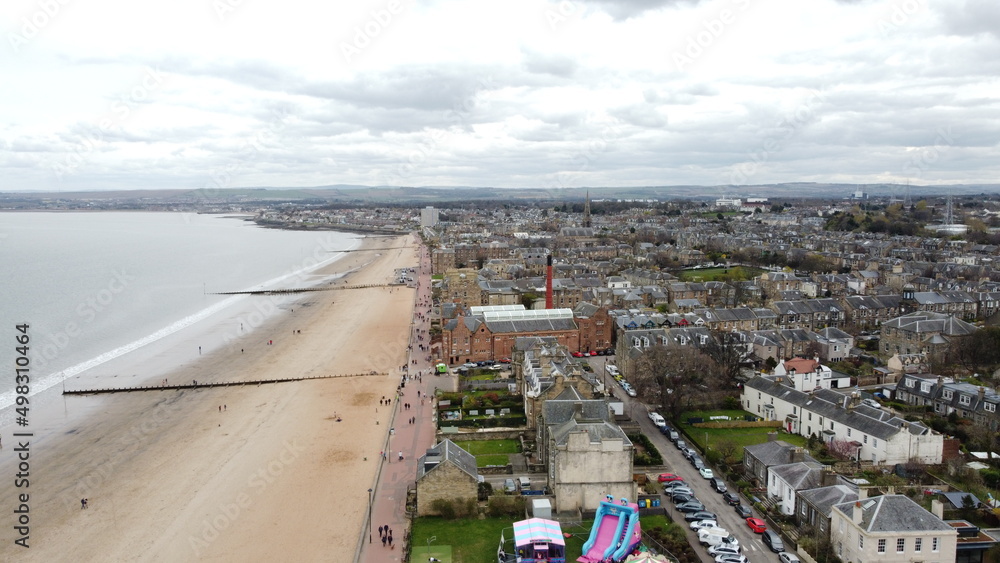 Panoramic view of Portobello beach in Edinburgh. Portobello Beach, a few miles from Edinburgh city centre, is a charming seaside suburb.