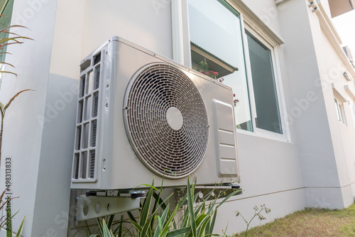 Air condition outdoor unit compressor install outside the house photo