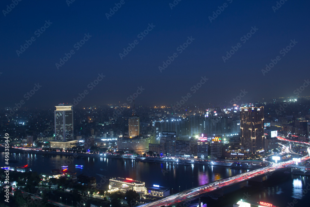 CAIRO, EGYPT - DECEMBER 29, 2021: Beautiful view of the center of Cairo and Zamalek island from the Cairo Tower in Cairo, Egypt CAIRO, EGYPT - DECEMBER 29, 2021: Beautiful view of the center of Cairo and Zamalek island from the Cairo Tower in Cairo, Egypt