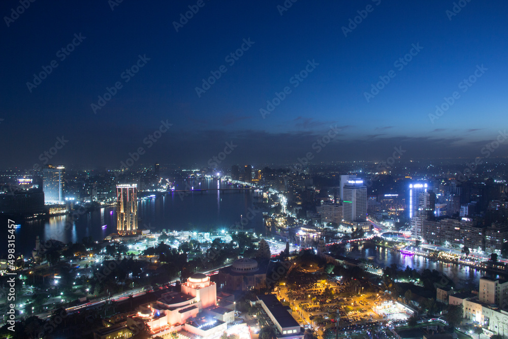 Obraz premium CAIRO, EGYPT - DECEMBER 29, 2021: Beautiful view of the center of Cairo and Zamalek island from the Cairo Tower in Cairo, Egypt