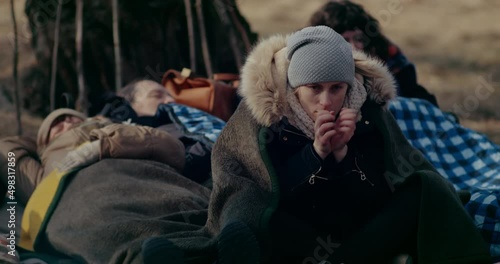 Refugee In Forest Feeling Cold During Russian-Ukrainian War.