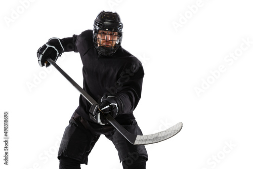 Counterattack. Professional male hockey player training in special uniform with helmet isolated over white background © master1305
