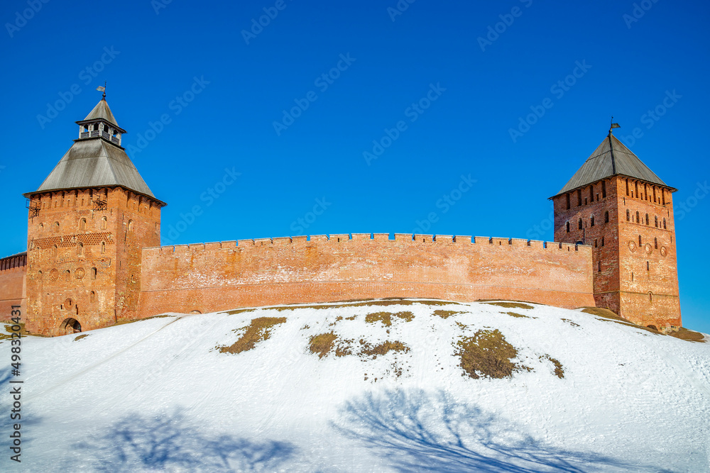Two ancient towers of the Kremlin of Veliky Novgorod on a sunny March day Two ancient towers of the Kremlin of Veliky Novgorod on a sunny March day