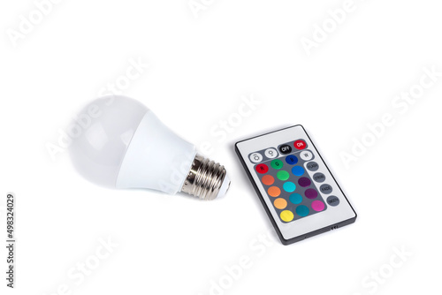 Multi color led bulb with a remote control on a white background