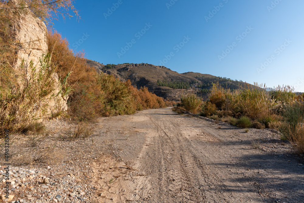 dirt road in a mountainous area in the south of Spain dirt road in a mountainous area in the south of Spain
