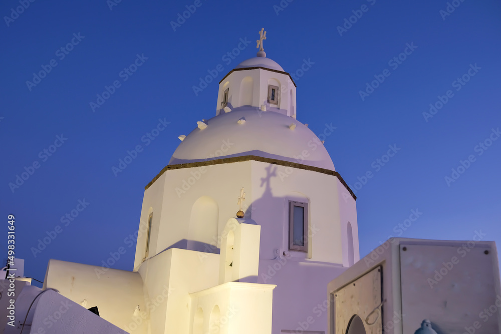 Closeup view of a beautiful whitewashed and traditional orthodox church in Santorini Greece Closeup view of a beautiful whitewashed and traditional orthodox church in Santorini Greece