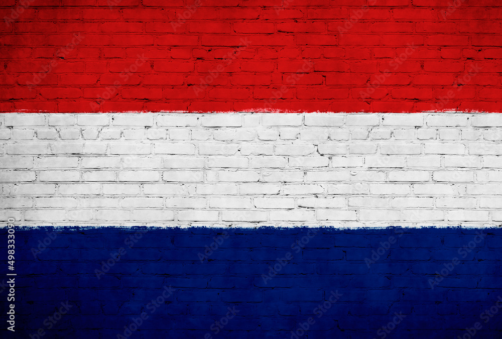 Netherlands flag painted on brick wall. National country flag background photo Netherlands flag painted on brick wall. National country flag background photo