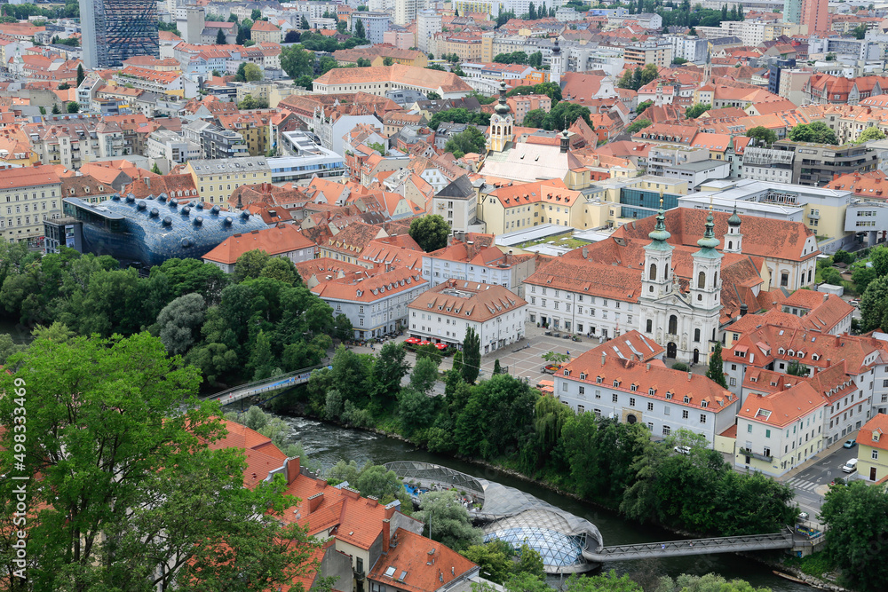 View from the Castle Mountain over the roofs to the city of Graz situated at the River Mur	
