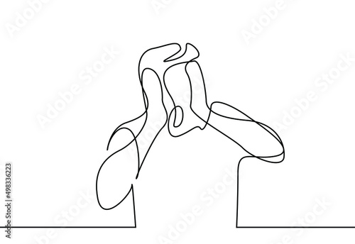A man with his hands on his face shouts and screams