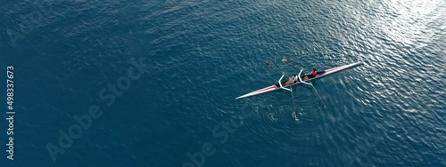 Fotografiet Aerial drone ultra wide top down panoramic photo with copy space of sport canoe