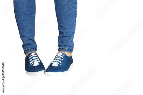 Women Leg Jeans and blue sports Sneakers isolated on white background