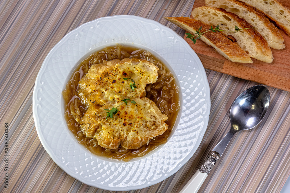 Classic French onion soup baked with cheese croutons